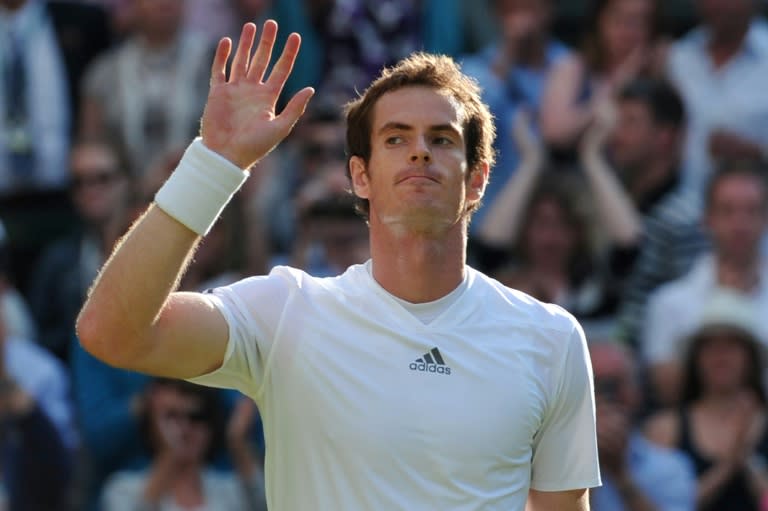 Emotional farewell: Andy Murray pictured at Wimbledon in 2013 when he won his first title (CARL COURT)