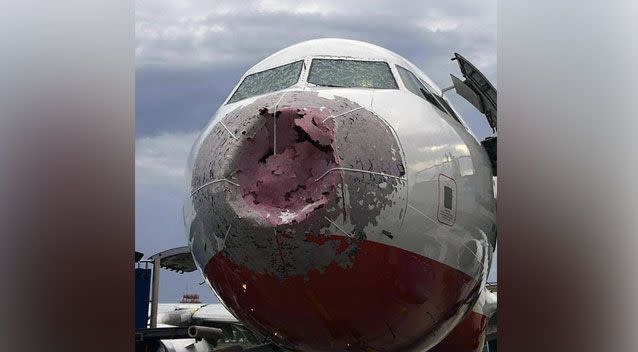 The nose of the plane was thrashed by giant hailstones and the front windscreen was smashed. Photo: East2West News