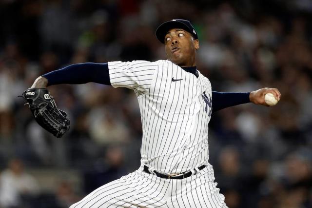 What questions are answered — or raised — with the Rangers' trade for LHP Aroldis  Chapman?