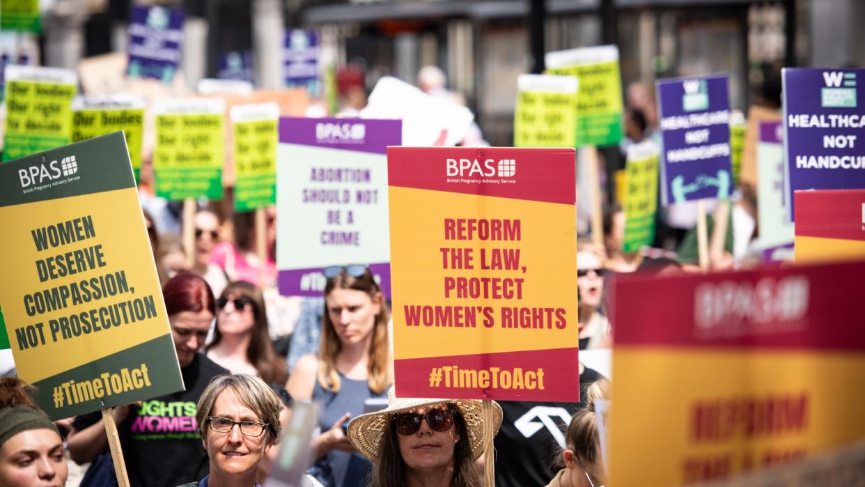  Pro-choice protesters march in London. 