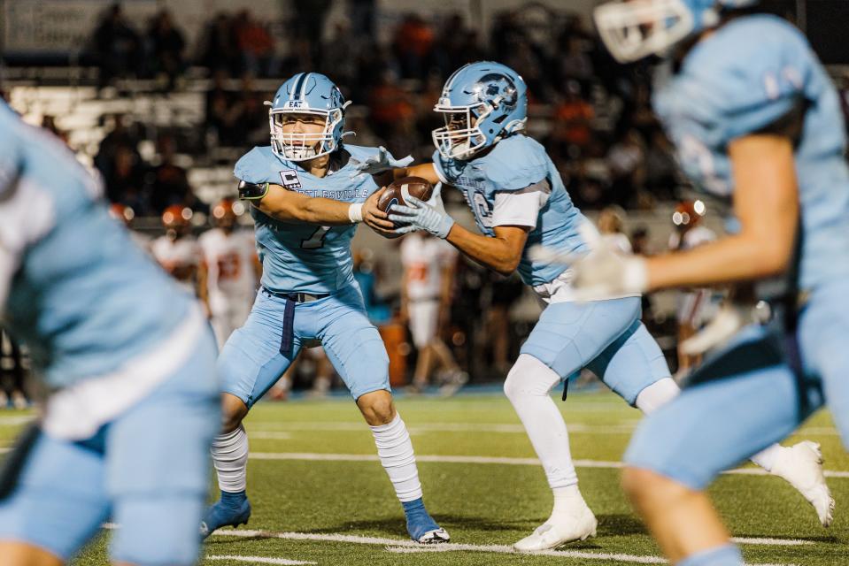 Bartlesville's unstoppable duo QB Neal Nate and RB PJ Wallace go to work during Thursday night's game.