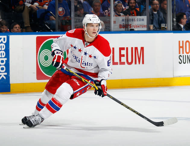 UNIONDALE, NY – APRIL 21: Andre Burakovsky #65 of the Washington Capitals skates against the New York Islanders in Game Four of the Eastern Conference Quarterfinals during the 2015 NHL Stanley Cup Playoffs at Nassau Veterans Memorial Coliseum on April 21, 2015 in Uniondale, New York. The Capitals defeated the Islanders 2-1 in overtime. (Photo by Bruce Bennett/Getty Images)