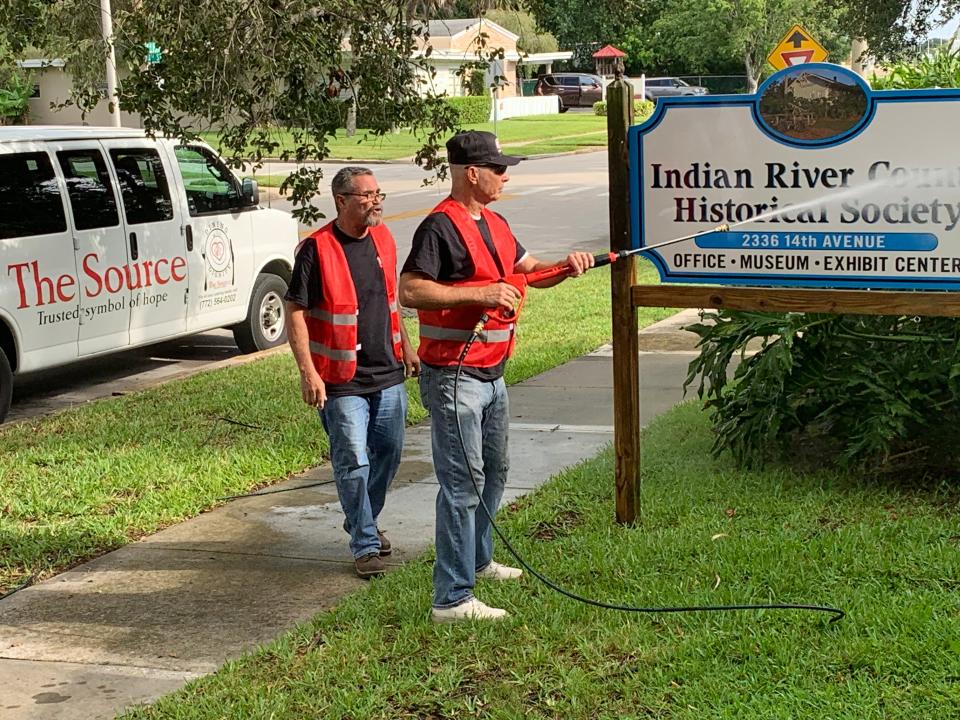 The Source's Pablo Acevedo and Ronald Rupchis work together pressure cleaning in front of the Indian River County Historical Society, the old Vero Beach train station, on 14th Avenue, Thursday, June 1, 2023. The Source's Community Works program plans to send its homeless clients into the city to clean areas 9 a.m. to 1 p.m. Mondays, Wednesdays and Fridays.