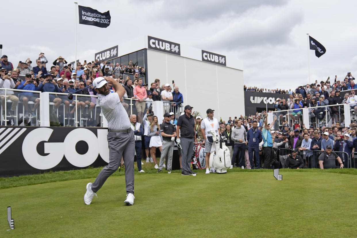 Dustin Johnson of the United States plays from the first tee during the first round of the inaugural LIV Golf Invitational at the Centurion Club in St. Albans, England, on June 9, 2022. (Alastair Grant / AP file)