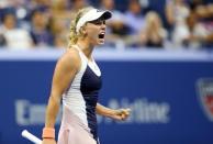 Sep 3, 2015; New York, NY, USA; Caroline Wozniacki of Denmark reacts after winning a point in her match against Petra Cetkovska of Czech Republic on day four of the 2015 U.S. Open tennis tournament at USTA Billie Jean King National Tennis Center. Mandatory Credit: Jerry Lai-USA TODAY Sports