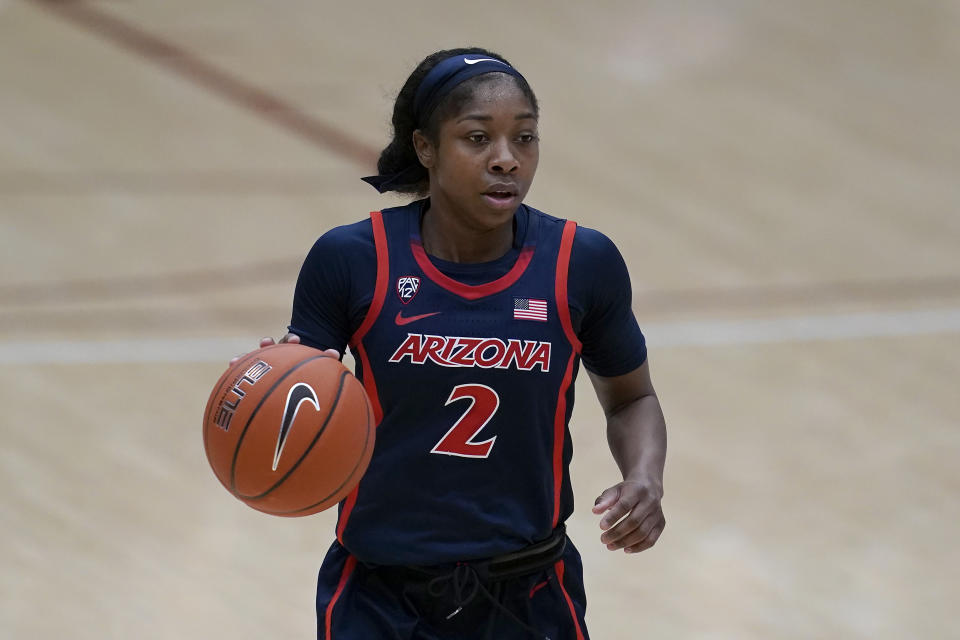 Arizona guard Aari McDonald (2) dribbles against Stanford during the second half of an NCAA college basketball game in Stanford, Calif., Monday, Feb. 22, 2021. (AP Photo/Jeff Chiu)