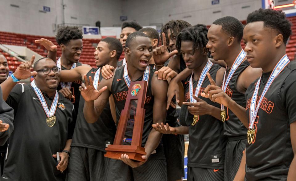 The Leesburg boys basketball team celebrates after winning its second straight Class 6A state championship in 2018. Daily Commercial sports reporter Frank Jolley considers this to be the greatest public school boys basketball team from Lake and Sumter counties.