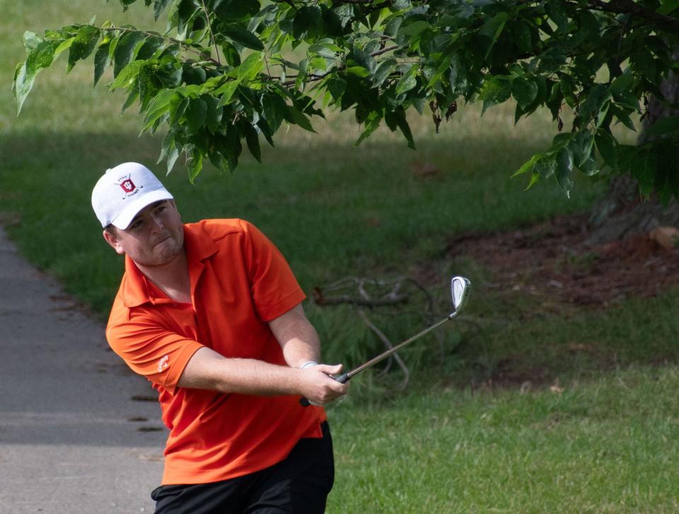 Jace Day shoots on the seventh hole at Cascades Golf Course in the Bloomington City Golf Tournament on July 9, 2023.