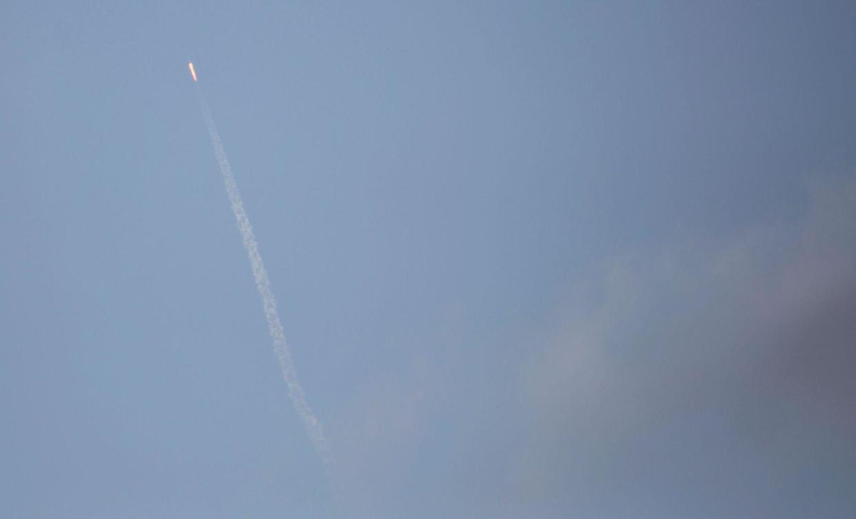 The SpaceX Falcon 9 rocket, carrying a Dragon cargo capsule, is seen from Port Canaveral, Florida, as it launches from the Kennedy Space Center Launch Complex 39A on February 19, 2017: GREGG NEWTON/AFP/Getty Images