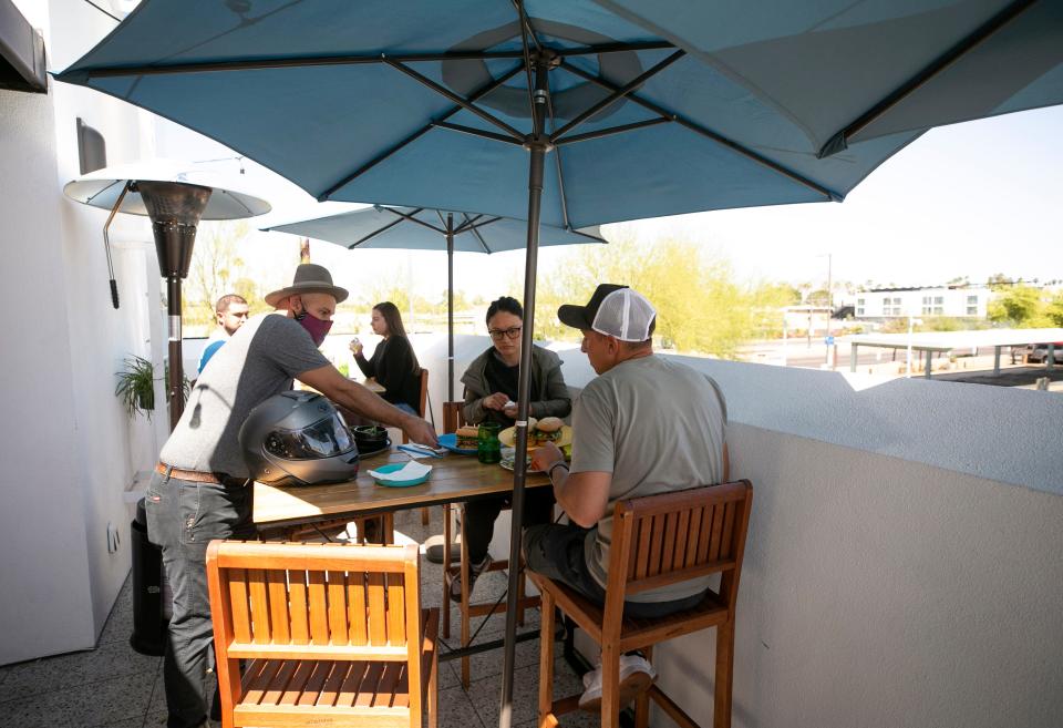 The rooftop dining area at Belly, a restaurant at the intersection of Seventh Street and Camelback Road in Phoenix that opened during the pandemic as takeout only and has since phased into dine-in.