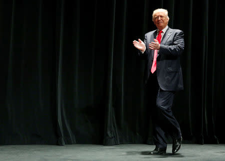 Donald Trump takes the stage to rally with supporters in Toledo, Ohio. REUTERS/Jonathan Ernst