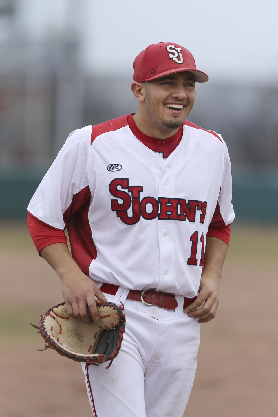 FILE - In this March 25, 2017, file photo, St. John's John Valente smiles during an NCAA college baseball game against Maine in New York. Blankmeyer fully expected his St. John's baseball team to have a solid start to the season. But not even the veteran coach could have predicted the Red Storm to roll quite like this. "It's been a blast," junior first baseman Valente said. (AP Photo/Gregory Payan, File)