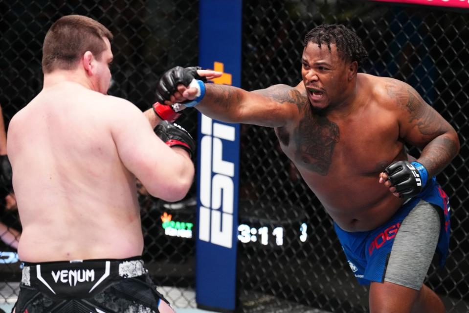 LAS VEGAS, NEVADA – FEBRUARY 03: (R-L) Jamal Pogues punches Thomas Petersen in a heavyweight fight during the UFC Fight Night event at UFC APEX on February 03, 2024 in Las Vegas, Nevada. (Photo by Chris Unger/Zuffa LLC via Getty Images)