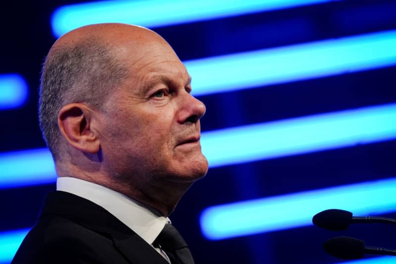 German Chancellor Olaf Scholz delivers a speech during an event on the occasion of German Construction Day (#TBI24).  Kay Nietfeld/dpa