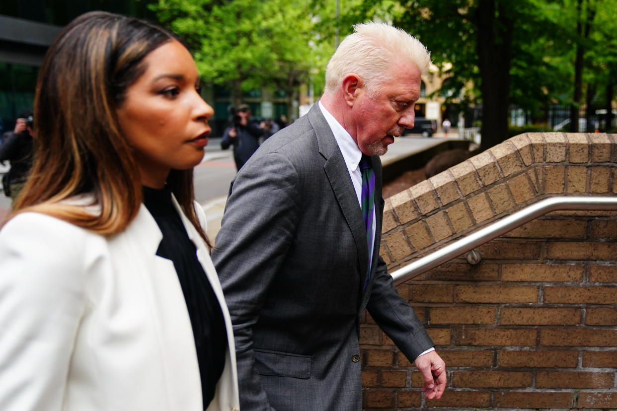 Three-time Wimbledon champion Boris Becker, arrives alongside partner Lilian de Carvalho Monteiro, for sentencing at Southwark Crown Court, in London, after he was found guilty of four charges under the Insolvency Act during his bankruptcy trial. Picture date: Friday April 29, 2022.