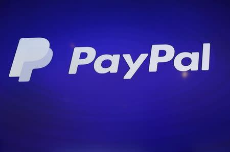 The PayPal logo is seen during an event at Terra Gallery in San Francisco, California May 21, 2015. REUTERS/Robert Galbraith