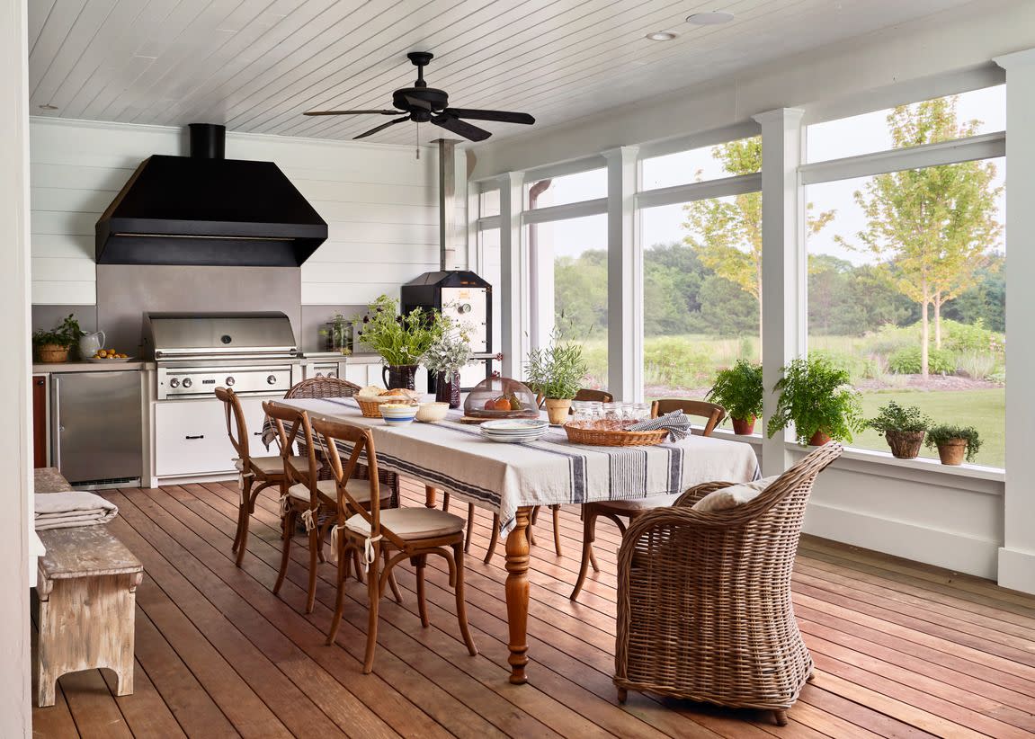 outdoor kitchen on a screened in porch