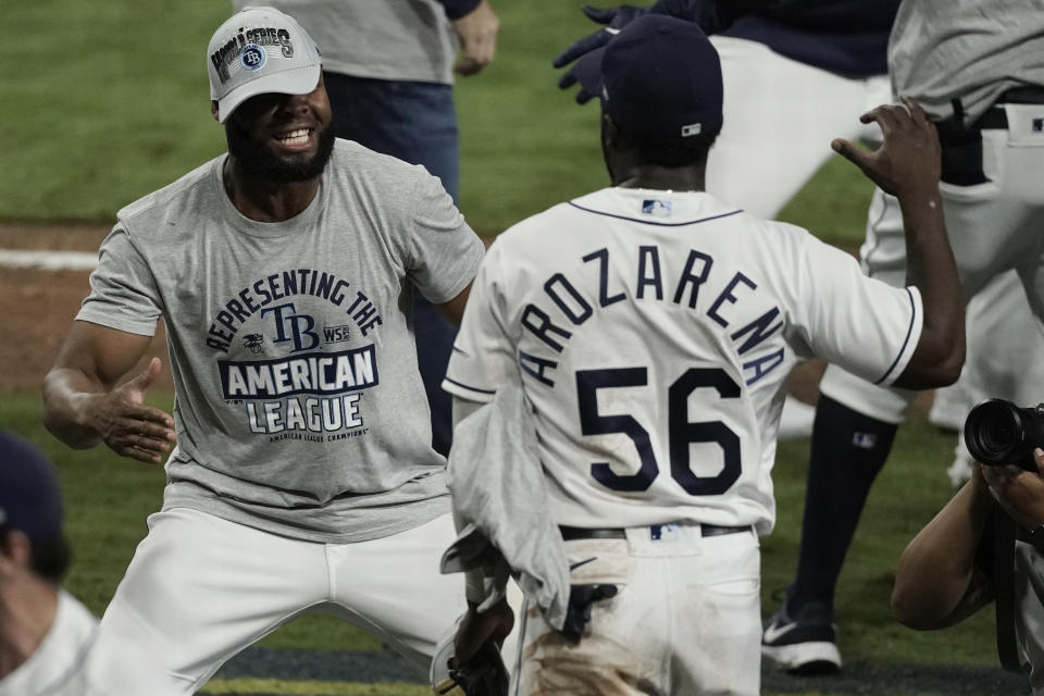 Tampa Bay Rays Randy Arozarena celebrates their victory against the Houston Astros in Game 7 of a baseball American League Championship Series, Saturday, Oct. 17, 2020, in San Diego. The Rays defeated the Astros 4-2 to win the series 4-3 games. (AP Photo/Ashley Landis)