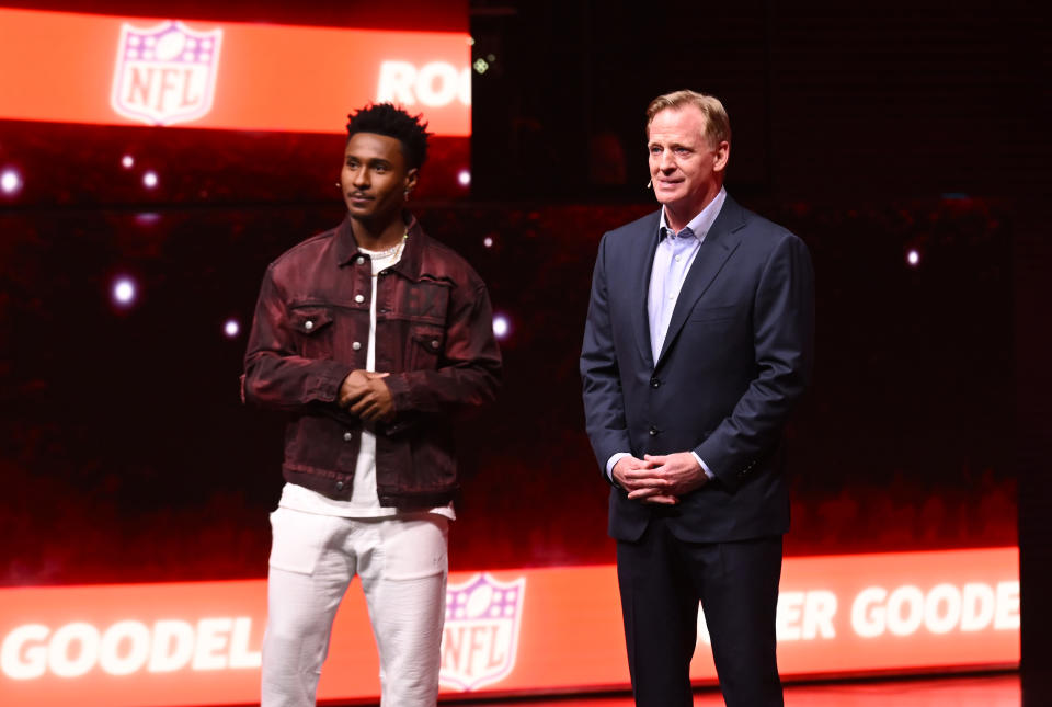 Deestroying and Roger Goodell onstage at YouTube Brandcast 2023 in New York City. (Getty Images)