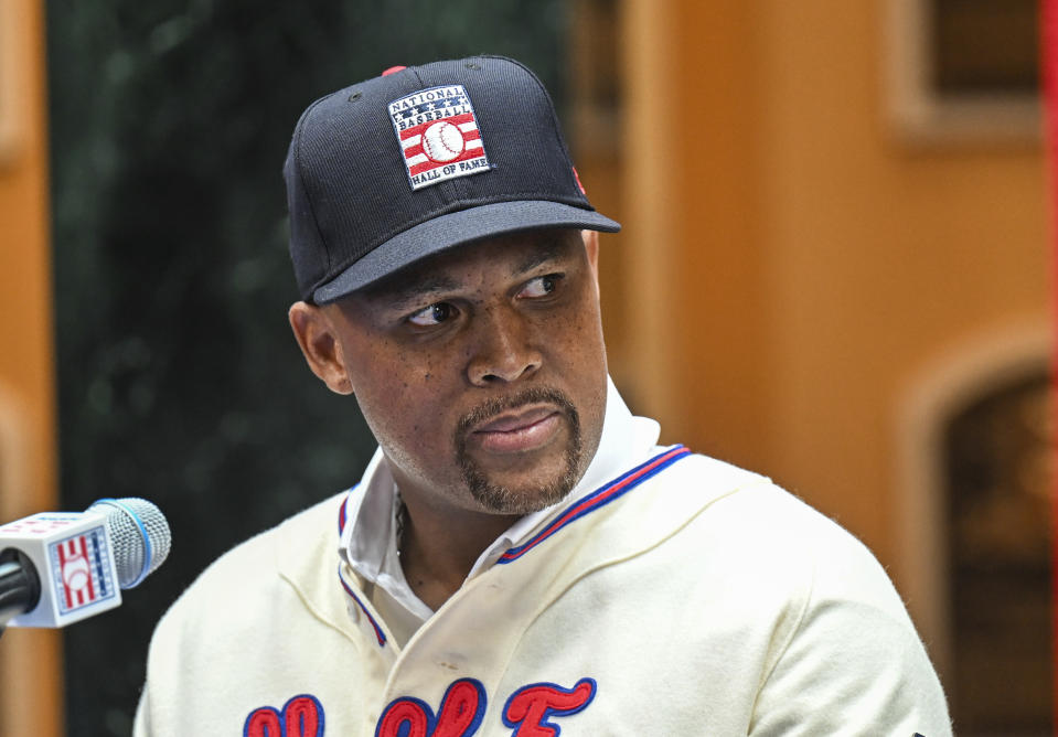 Newly elected Baseball Hall of Fame inductee Adrián Beltré talks with reporters during a news conference Thursday, Jan. 25, 2024, in Cooperstown, N.Y. (AP Photo/Hans Pennink)