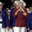 Tennis player Maria Sharapova, center, leads the Russian delegation during the Opening Ceremony at the 2012 Summer Olympics, Friday, July 27, 2012, in London. (AP Photo/Julio Cortez)