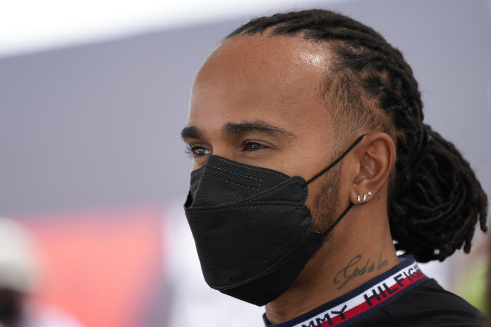 Mercedes driver Lewis Hamilton, of Britain, responds to a question during a news conference before the Formula One U.S. Grand Prix auto race at Circuit of the Americas, Thursday, Oct. 21, 2021, in Austin, Texas. (AP Photo/Nick Didlick)