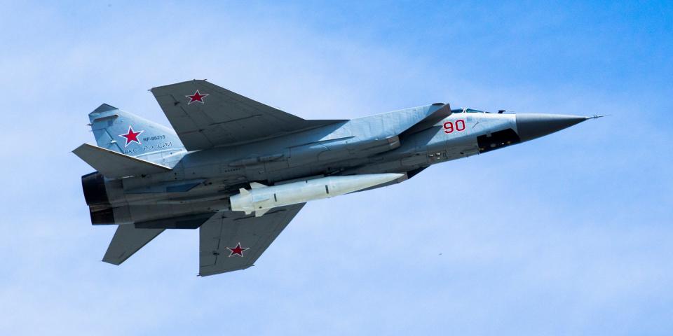 A Russian Air Force MiG-31K jet carries a high-precision hypersonic aero-ballistic missile Kh-47M2 Kinzhal during the Victory Day military parade to celebrate 73 years since the end of WWII and the defeat of Nazi Germany, in Moscow, Russia, Wednesday, May 9, 2018.