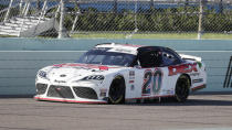 Harrison Burton (20) drives during a NASCAR Xfinity Series auto race Saturday, June 13, 2020, in Homestead, Fla. (AP Photo/Wilfredo Lee)