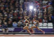 Britain's Jessica Ennis (R) and Canada's Brianne Theisen compete in heat 5 of the women's heptathlon 200m at the London 2012 Olympic Games at the Olympic Stadium August 3, 2012.