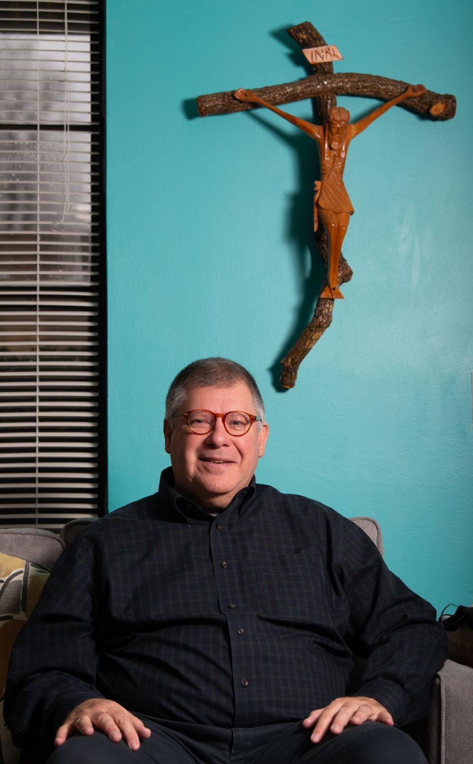 Steve Wolf is surrounded by religious artwork in his Nashville home. Wolf, who is gay, is a former Catholic priest who resigned amid furor over his sexual orientation. He and his partner plan to soon enter into a civil union.