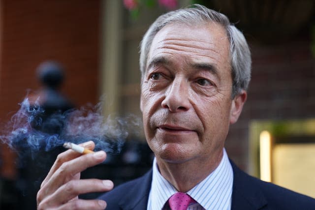 Reform UK leader Nigel Farage smoking a cigarette