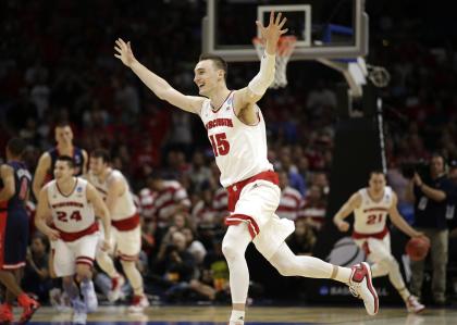 Wisconsin forward Sam Dekker (15) celebrates after Wisconsin beat Arizona 85-78 in a college basketball regional final in the NCAA Tournament, Saturday, March 28, 2015, in Los Angeles. Wisconsin advances to the Final Four in Indianapolis. (AP Photo/Jae C. Hong)