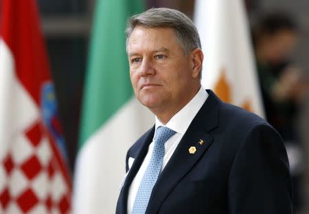 Romanian President Klaus Werner Iohannis arrives at a European Union leaders summit in Brussels, Belgium, March 22, 2018. REUTERS/Francois Lenoir