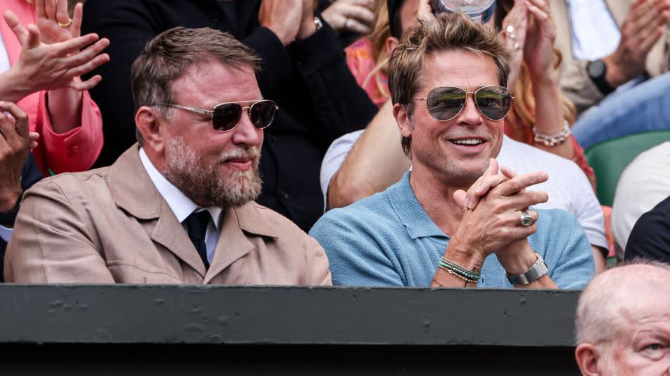 Brad Pitt with Guy Ritchie (L) at the Men's final at Wimbledon in London on July 16, 2023. - Shi Tang/Getty Images