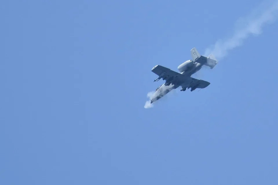 An A-10 Thunderbolt II aircraft above the ballistic missile submarine USS Wyoming on July 15.