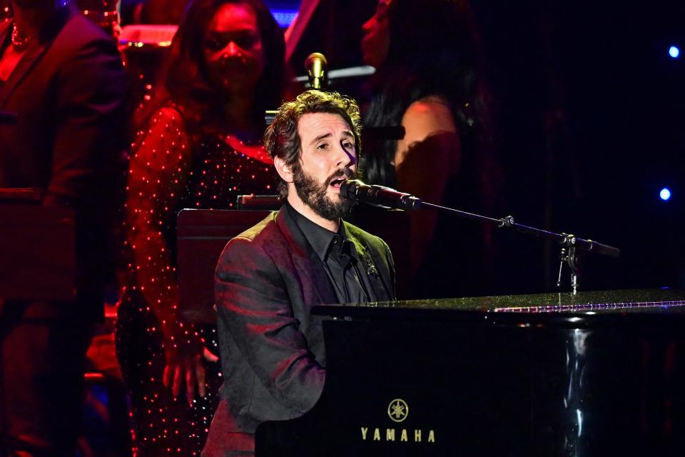 Josh Groban, a frequent presence at Clive Davis' annual Pre-Grammy Gala, shared his booming baritone on songs from Stephen Sondheim and Simon & Garfunkel's "Bridge Over Troubled Water."