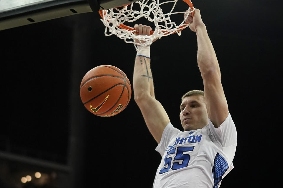 FILE - Creighton guard Baylor Scheierman dunks the ball during the first half of an NCAA college basketball game against Loyola Chicago Wednesday, Nov. 22, 2023, in Kansas City, Mo. Scheierman was selected to the AP All-Big East first team in balloting released Tuesday, March 12, 2024.(AP Photo/Charlie Riedel, File)
