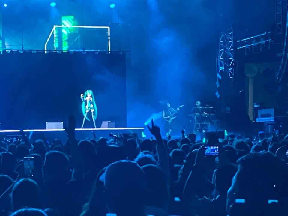 Hatsune Miku, an animated projection, peformed at the Coachella Valley Music and Arts Festival with her bandmates Friday night