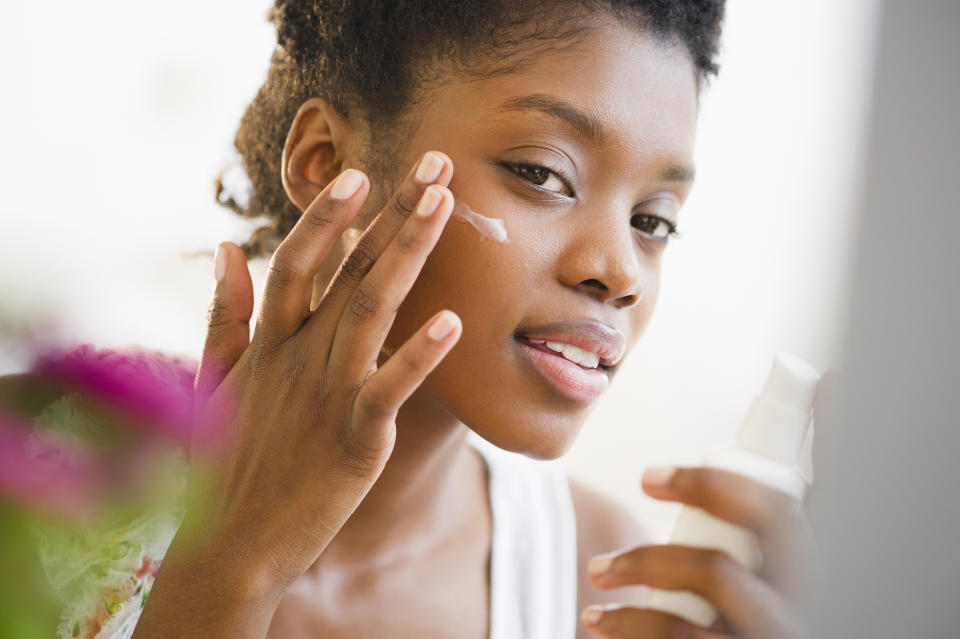 Applying sunscreen to the face is important, but don't gforget about the rest of the body. Getty Images.