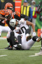 <p>Hardy Nickerson #56 of the Cincinnati Bengals tackles Seth Roberts #10 of the Oakland Raiders during the third quarter at Paul Brown Stadium on December 16, 2018 in Cincinnati, Ohio. (Photo by John Grieshop/Getty Images) </p>