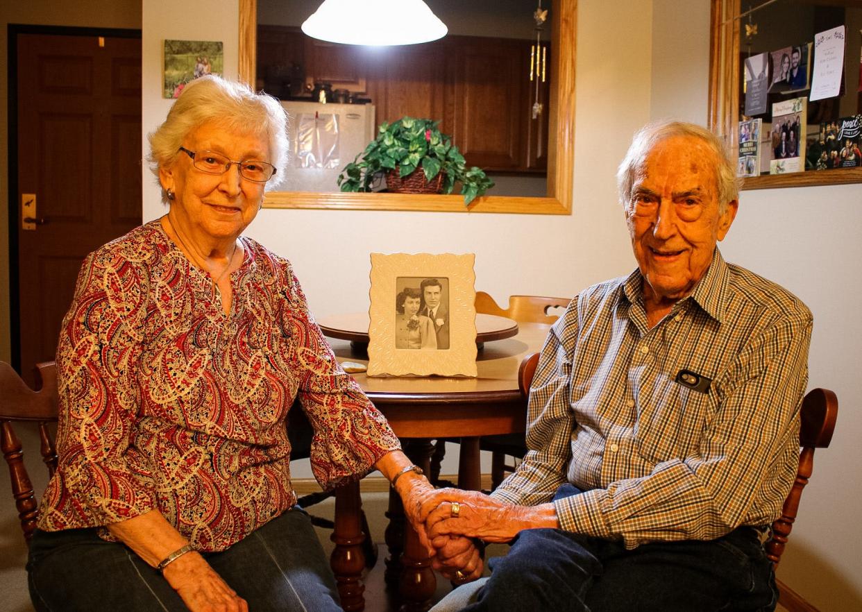 Velma and Marlin Ames hold hands at their apartment in Salina. The two are celebrating their 75th wedding anniversary Feb. 28.