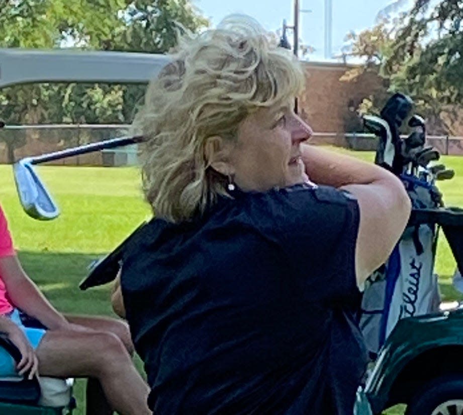 Lori Horan, who has 23 Women's Metro championships to her credit, watches her tee shot at Erskine Park's 17th hole during the first round Monday. Horan opened with an eight-over 78 and was three strokes behind leader Selah Unwin with the 54-hole tournament headed to Elbel Park for Tuesday's second round.