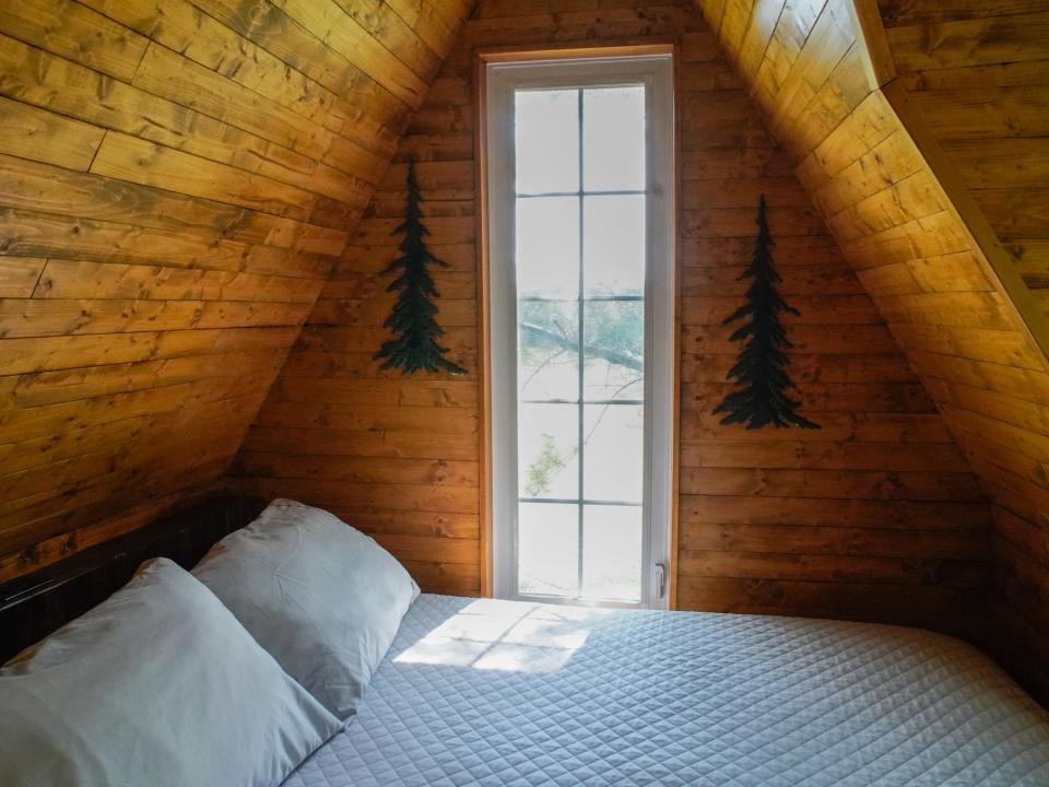 The bed inside the treehouse