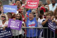 People arrive ahead of a campaign rally with President Donald Trump Tuesday, Sept. 8, 2020, in Winston-Salem, N.C. (AP Photo/Chris Carlson)