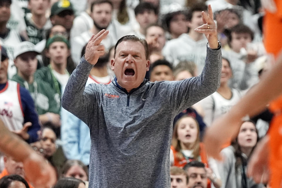 Illinois head coach Brad Underwood yells from the sideline during the first half of an NCAA college basketball game against Michigan State, Saturday, Feb. 10, 2024, in East Lansing, Mich. (AP Photo/Carlos Osorio)