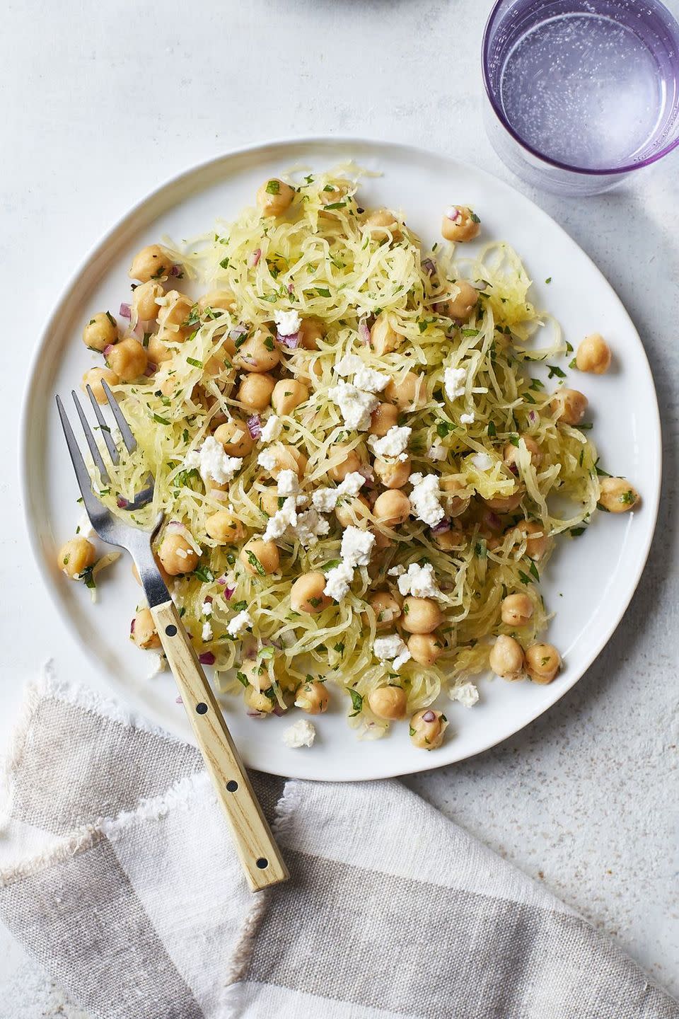 <p>Give your spaghetti squash a boost by adding chickpeas, lemon juice, and crumbled feta cheese. </p><p><em><a href="https://www.womansday.com/food-recipes/food-drinks/a16764648/spaghetti-squash-and-chickpea-saute-recipe/" rel="nofollow noopener" target="_blank" data-ylk="slk:Get the Spaghetti Squash and Chickpea Sauté recipe.;elm:context_link;itc:0;sec:content-canvas" class="link ">Get the Spaghetti Squash and Chickpea Sauté recipe.</a></em> </p><p><strong>What You'll Need</strong>: <a href="https://www.amazon.com/dp/B086JL7S3R/" rel="nofollow noopener" target="_blank" data-ylk="slk:Parchment paper;elm:context_link;itc:0;sec:content-canvas" class="link ">Parchment paper</a> ($15, Amazon)</p>