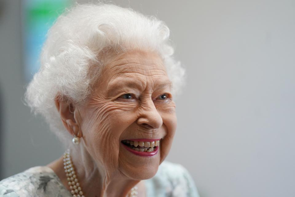 Britain's Queen Elizabeth II smiles during a visit to officially open the new building of Thames Hospice in Maidenhead, Berkshire, on July 15, 2022. 