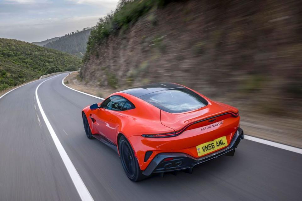 a red sports car on a road