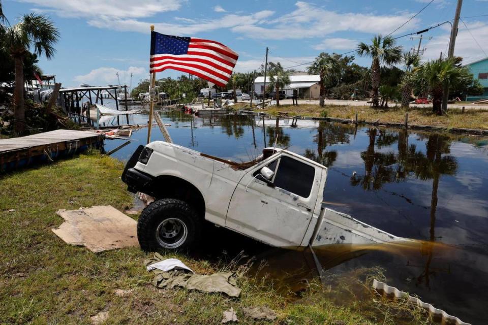 A truck ended up in a canal, part of the aftermath of Hurricane Idalia in Horseshoe Beach, Florida on Thursday, August 31, 2023.