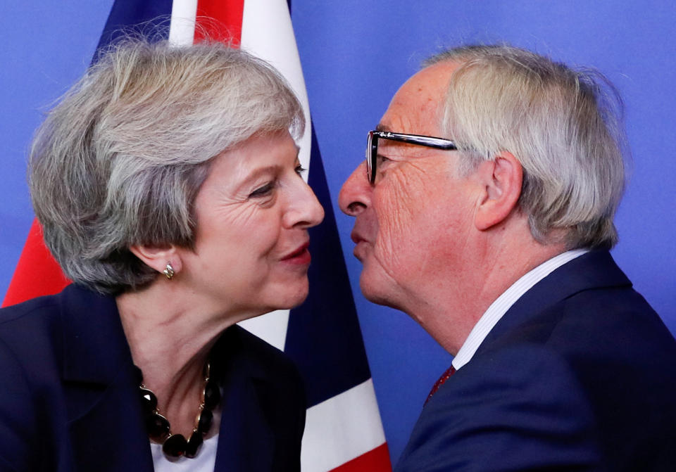 European Commission president Jean-Claude Juncker welcomes Theresa May to Brussels (Getty)